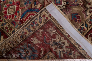 Karabagh Runner

3.1 by 14.9

The wine red main border displays ac colourful "crab" pattern and surrounds the rather worn   khaki field with its polychrome, elaborate Herati design.  This attractive south  ...