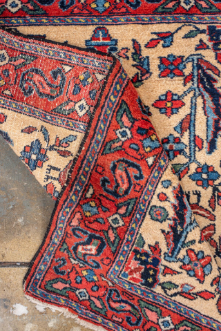 Antique Persian Malayer Rug, circa 1920. Featuring an ivory field with delicate floral and boteh motifs framed by a bold red border. Finely drawn village design with crisp detail and balanced color.

Item  ...