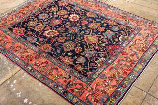 Antique Persian Bidjar Rug, circa 1900. Featuring an intricate floral design on a deep navy field with soft coral and light blue accents, framed by a lively pictorial border. Dense, durable weave ...