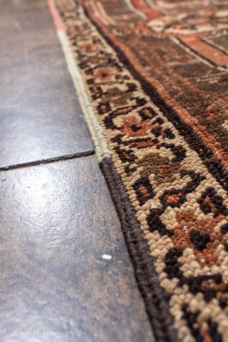 Antique Persian Serapi Carpet, circa 1900. Featuring a bold geometric medallion on a warm rust field with soft blue and ivory accents, framed by a classic Heriz-style border. Strong Northwest Persian design  ...