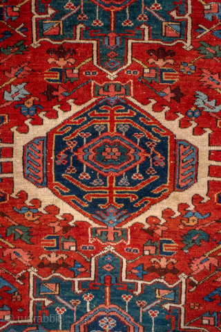 Antique Persian Karaje Rug, circa 1910. Featuring bold geometric medallions on a rich red field with deep blue and ivory accents, framed by a lively tribal border with strong Northwest Persian character.
Item ...