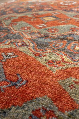 Antique Kurdish Rug, circa 1920. Featuring bold geometric medallions on a softly abrash blue-gray field with warm rust, ivory, and soft green accents, surrounded by a lively tribal border.

Item No. 101578

4'4" x  ...