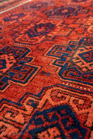 Antique Belouch Rug, circa 1920. Featuring repeating geometric guls on a rich red field with deep navy accents, framed by multiple narrow tribal borders. Compact, finely drawn design with classic Baluch character.

Item  ...