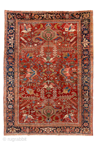 Antique Persian Heriz Carpet, Circa 1900. Striking allover geometric Tree of Life design woven across a richly colored brick-red field with a deep indigo border. Balanced composition and architectural presence make it  ...