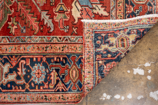 Antique Persian Heriz Carpet, Circa 1900. Striking allover geometric Tree of Life design woven across a richly colored brick-red field with a deep indigo border. Balanced composition and architectural presence make it  ...