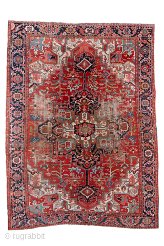 Antique Persian Serapi Carpet, Circa 1900. Striking elongated medallion set against a richly abrashed terracotta field framed by a deep navy border.
10'0" x 13'5"
Item No: 100255