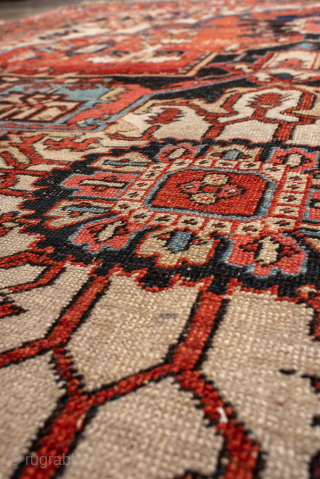 Antique Persian Serapi Carpet, Circa 1900. Striking cruciform medallion within a warm terracotta field accented by ivory, deep navy, and soft blue details.
9'7" x 13'5"
Item No: 100555