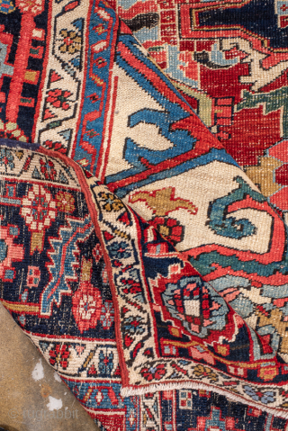 Antique Persian Serapi Carpet, Circa 1900. Bold crimson stepped medallion surrounded by ivory and sky-blue geometric motifs, framed by a richly detailed midnight-blue border.

10'0" x 12'5"

Item No: 101185     