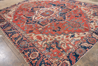 Antique Persian Serapi Carpet, Circa 1900. Bold ivory cruciform medallion set within a vibrant brick-red field framed by a richly detailed indigo border.

9'4" x 12'2"

Item No: 101637      