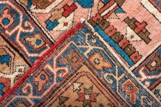 Antique Persian Serapi Carpet, Circa 1900. Impressive oversized geometric medallion on a vibrant brick-red field framed by an elegant ivory border.
11'4" x 13'4"
Item No: 92192