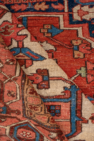 Antique Persian Serapi Carpet, Circa 1900. Commanding geometric medallion framed by a warm terracotta field and striking ivory spandrels.
10'8" x 13'7"
Item No: 99644