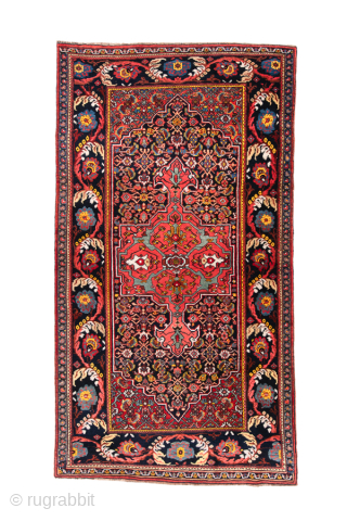 Antique Persian Bidjar Runner, Circa 1910. Vibrant crimson geometric medallion on a deep midnight-blue Herati field framed by a dramatic turtle-palmette border.