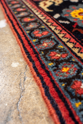Antique Persian Bidjar Runner, Circa 1910. Vibrant crimson geometric medallion on a deep midnight-blue Herati field framed by a dramatic turtle-palmette border.