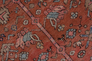 Antique Persian Serapi Carpet, Circa 1900. Rare, spacious design with a large terracotta lozenge medallion set against an ivory field accented by soft sky-blue spandrels.
11'5" x 16'8"
Item No: 59200