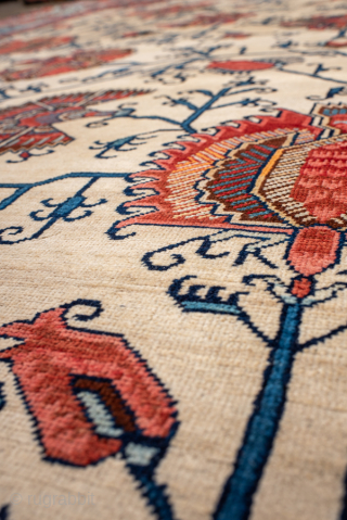 Antique Persian Serapi Carpet, Circa 1900. Rare allover floral design woven across a luminous ivory field framed by a striking sky-blue border.
12'0" x 16'0"
Item No: 6566