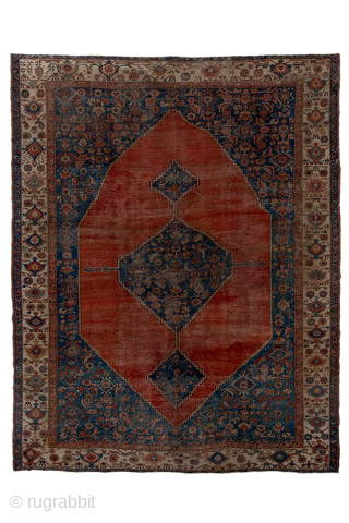 Antique Persian Serapi Carpet, Circa 1900. Dramatic oversized salmon-red medallion set against a richly detailed indigo field and framed by an elegant ivory border.
11'1" x 13'9"
Item No: 95849