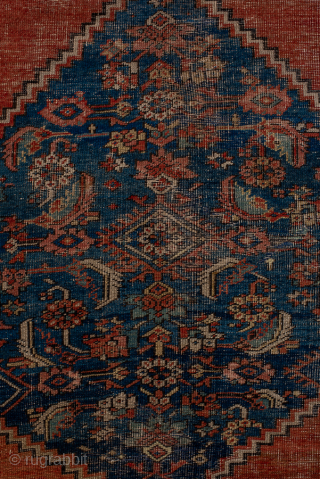 Antique Persian Serapi Carpet, Circa 1900. Dramatic oversized salmon-red medallion set against a richly detailed indigo field and framed by an elegant ivory border.
11'1" x 13'9"
Item No: 95849
