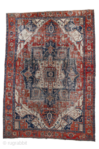 Antique Persian Serapi Carpet, Circa 1900. Dramatic stepped medallion set within a richly abrashed terracotta and indigo field framed by bold ivory spandrels and a geometric border.
11'2" x 15'9"
Item No: 97824