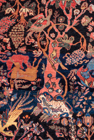 Antique Persian Bidjar Pictorial Rug, Circa 1920. Extraordinary Tree of Life design filled with birds, animals, flowering vines, and mythical creatures woven against a deep midnight blue field.

4'6" x 6'9"

Item No: 100617 