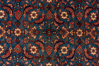 Antique Persian Bidjar Carpet, Circa 1910. Showcases a rare open crimson field centered by an elongated Herati medallion framed by finely detailed floral spandrels and an elegant navy border.

9'1" x 14'5"

Item No:  ...