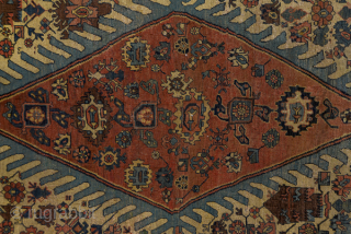 Antique Persian Bidjar Carpet, Circa 1910. Elegant ivory Herati field with an elongated rust diamond medallion framed by deep navy corner spandrels and a finely detailed floral border.
8'10" x 12'6"
Item No: 56181