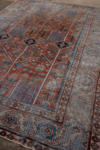 Antique Persian Serapi Carpet, Circa 1900. Showcases a rare allover Tree of Life design with stylized flowering trees and geometric motifs woven across a warm terracotta field.
8'0" x 10'9"
Item No: 97182