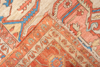 Antique Persian Serapi Carpet, Circa 1900. Striking geometric medallion set within a richly abrashed terracotta field accented by ivory spandrels and a finely detailed floral border.
11'9" x 18'5"
Item No: 99497