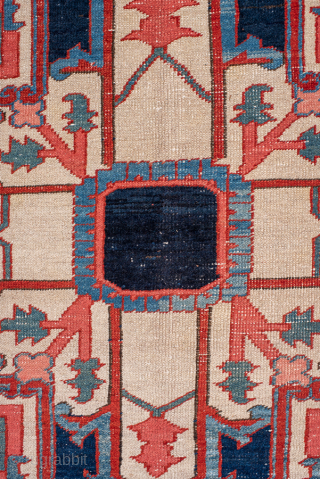 Antique Persian Serapi Carpet, Circa 1900. Striking elongated medallion set within a richly abrashed terracotta field highlighted by soft sky-blue accents and an elegant floral border.
11'0" x 20'0"
Item No: 99846