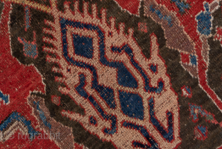 Antique Persian Bidjar Carpet, Circa 1920. Striking tribal composition with three elongated latch-hook medallions surrounded by bold geometric motifs woven in rich crimson and deep indigo.
3'9" x 7'2"
Item No: 36872