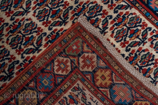 Antique Persian Bidjar Runner, Circa 1910. Rare allover Herati lattice woven across a warm ivory field framed by richly detailed terracotta and midnight blue borders.
2'9" x 15'9"
Item No: C90548