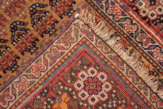 Antique Persian Bidjar Runner, Circa 1920. Finely detailed allover geometric floral design woven across a warm camel field framed by richly ornamented olive and terracotta borders.

3'2" x 11'3"

Item No: 98525   