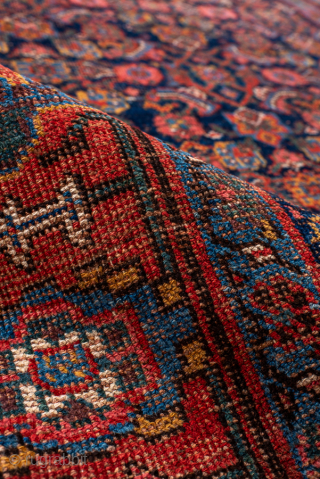 Antique Persian Bidjar Runner, Circa 1910. Finely woven allover Herati design across a deep midnight blue field framed by a bold terracotta tribal border.

4'6" x 8'7"

Item No: 99044     