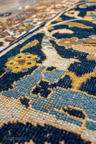Antique Persian Bidjar Runner, Circa 1900. Rare scrolling floral vine design woven across a rich midnight blue field and framed by multiple delicately ornamented ivory and sky-blue borders.
3'8" x 14'5"
Item No: 99859