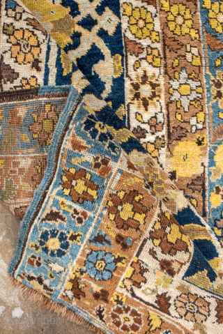 Antique Persian Bidjar Runner, Circa 1900. Rare scrolling floral vine design woven across a rich midnight blue field and framed by multiple delicately ornamented ivory and sky-blue borders.
3'8" x 14'5"
Item No: 99859