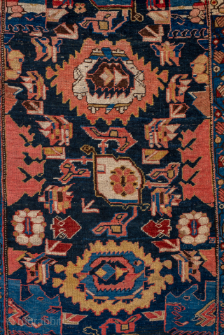 Antique Persian Bidjar Runner, Circa 1910. Elegant vertical arrangement of stylized palmettes and Herati-inspired floral motifs woven across a rich midnight blue field framed by finely detailed terracotta borders.
3'7" x 13'0"
Item No: ...