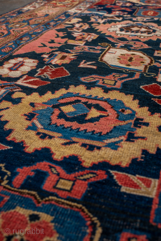 Antique Persian Bidjar Runner, Circa 1910. Elegant vertical arrangement of stylized palmettes and Herati-inspired floral motifs woven across a rich midnight blue field framed by finely detailed terracotta borders.
3'7" x 13'0"
Item No: ...