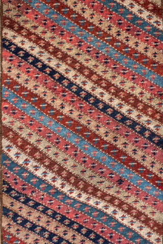 Antique Persian Bidjar Runner, Circa 1910. Rare allover diagonal striped design filled with finely woven geometric motifs in warm terracotta, ivory, and indigo.
3'2" x 16'6"
Item No: 99888