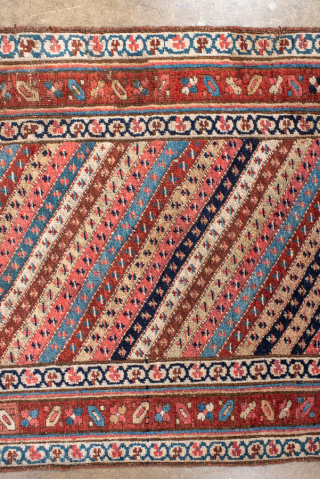 Antique Persian Bidjar Runner, Circa 1910. Rare allover diagonal striped design filled with finely woven geometric motifs in warm terracotta, ivory, and indigo.
3'2" x 16'6"
Item No: 99888
