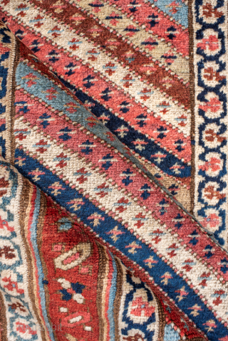 Antique Persian Bidjar Runner, Circa 1910. Rare allover diagonal striped design filled with finely woven geometric motifs in warm terracotta, ivory, and indigo.
3'2" x 16'6"
Item No: 99888