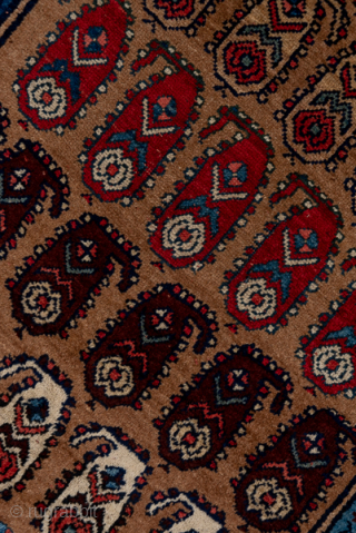 Antique Persian Bidjar Runner, Circa 1910. Refined allover lattice of repeating boteh motifs woven across a warm camel field framed by richly detailed midnight blue borders.
3'6" x 18'10"
Item No: C66490