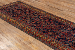 Antique Persian Bidjar Runner, Circa 1910. Finely woven allover Herati design across a rich midnight blue field framed by an elegant golden camel floral border.
3'8" x 10'4"
Item No: C93878