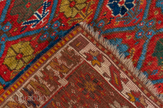 Antique Persian Kurdish Rug, Circa 1900. Finely woven allover lattice of hooked diamond medallions across a vibrant madder-red field framed by elegant ivory and geometric tribal borders.
4'8" x 8'8"
Item No: 41320