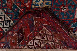 Antique Persian Kurdish Rug, Circa 1900. Finely detailed allover lattice of octagonal tribal motifs woven across a rich midnight blue field framed by crisp ivory geometric borders.
4'0" x 8'7"
Item No: C68492