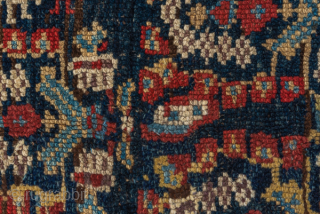 Antique Persian Kurdish Rug, Circa 1900. Richly woven allover Herati-inspired lattice framed by striking indigo borders filled with colorful geometric medallions.
4'8" x 8'0"
Item No: C90583