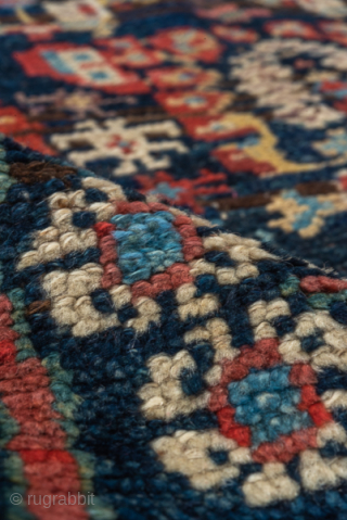 Antique Persian Kurdish Rug, Circa 1900. Richly woven allover Herati-inspired lattice framed by striking indigo borders filled with colorful geometric medallions.
4'8" x 8'0"
Item No: C90583