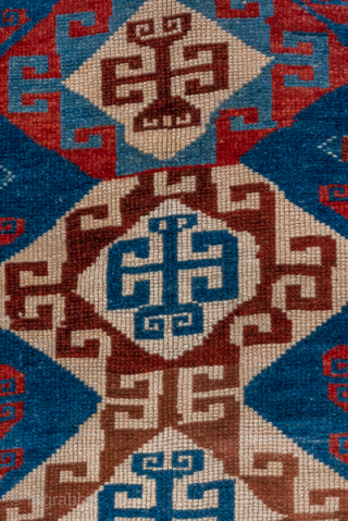 Antique Persian Kurdish Rug, Circa 1900. Dramatic series of hooked hexagonal medallions woven across a brilliant sapphire-blue field framed by vibrant serrated tribal borders.
2'9" x 8'8"
Item No: C93657