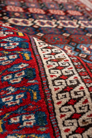 Antique Persian Kurdish Runner, Circa 1900. Dense allover arrangement of small geometric motifs organized in rhythmic horizontal rows.
3'7" x 12'0"
Item No: 99091