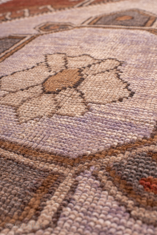 Antique Turkish Kars Rug with Central Medallion, Circa 1920. Features a bold geometric medallion set against a warm rust-brown field.
4'10" x 6'9"
Item No: 101997