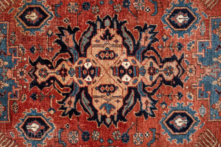 Antique Persian Heriz Rug with Geometric Medallion, Circa 1910. Bold geometric medallion surrounded by angular floral motifs on a warm madder-red field.

4'0" x 6'4"

Item No: 102014       