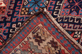 Antique Persian Kurdish Runner with Diamond Lattice Design, Circa 1900. Features an interlocking diamond lattice filled with colorful geometric floral motifs.
3'10" x 15'0"
Item No: 99056